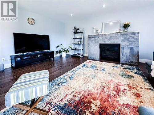 11 Kesmark Court, Moncton, NB - Indoor Photo Showing Living Room With Fireplace