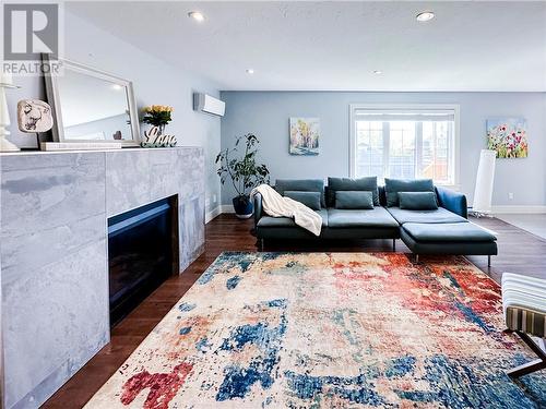 11 Kesmark Court, Moncton, NB - Indoor Photo Showing Living Room With Fireplace