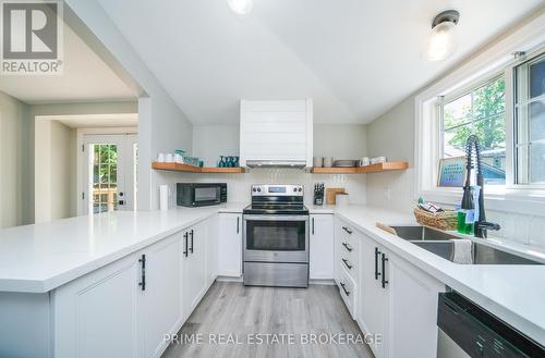 14 Warwick Avenue, Lambton Shores (Grand Bend), ON - Indoor Photo Showing Kitchen With Double Sink With Upgraded Kitchen