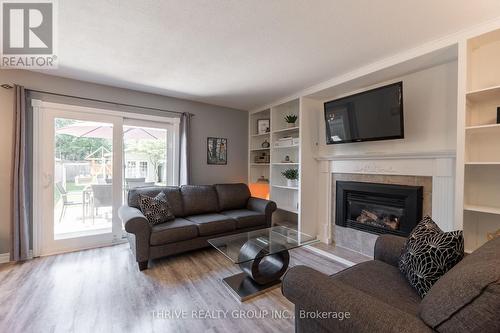669 Ladybrook Crescent, London, ON - Indoor Photo Showing Living Room With Fireplace