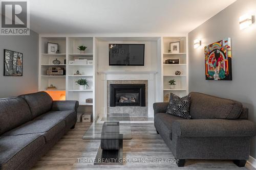 669 Ladybrook Crescent, London, ON - Indoor Photo Showing Living Room With Fireplace