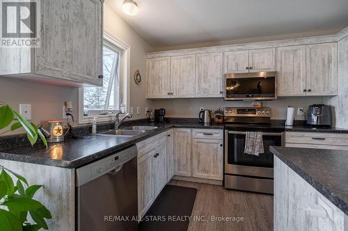 16 Kenver Street, Kawartha Lakes, ON - Indoor Photo Showing Kitchen With Double Sink