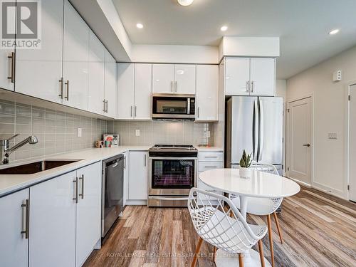 12 - 3492 Widdicombe Way, Mississauga (Erin Mills), ON - Indoor Photo Showing Kitchen With Stainless Steel Kitchen With Upgraded Kitchen