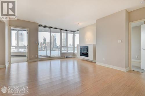 1609 4808 Hazel Street, Burnaby, BC - Indoor Photo Showing Living Room With Fireplace