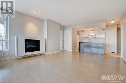 1609 4808 Hazel Street, Burnaby, BC - Indoor Photo Showing Living Room With Fireplace
