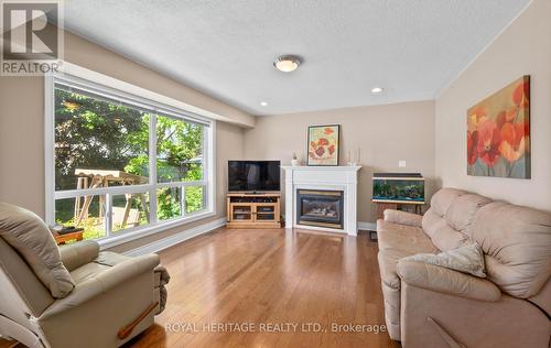 31 Sagewood Avenue, Clarington, ON - Indoor Photo Showing Living Room With Fireplace