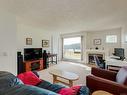 205-6585 Country Rd, Sooke, BC  - Indoor Photo Showing Living Room With Fireplace 