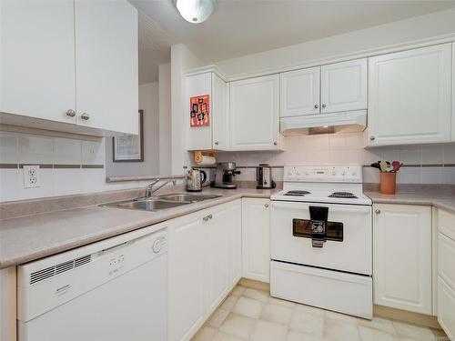 205-6585 Country Rd, Sooke, BC - Indoor Photo Showing Kitchen With Double Sink