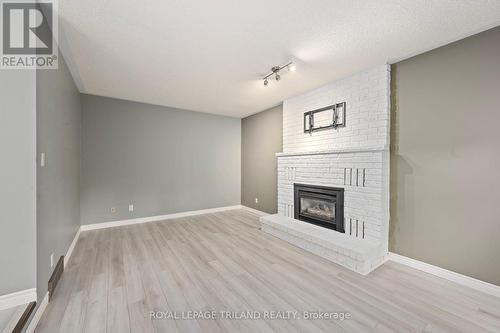 299 Walmer Grove, London, ON - Indoor Photo Showing Other Room With Fireplace