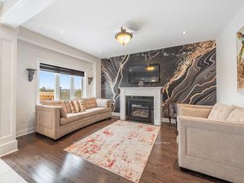 878 John St, Innisfil, ON - Indoor Photo Showing Living Room With Fireplace