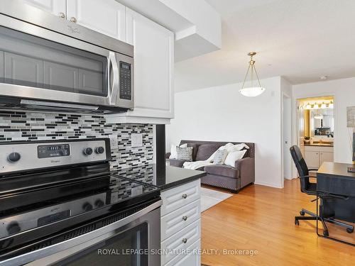 203-1005 Nadalin Hts, Milton, ON - Indoor Photo Showing Kitchen