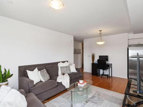 203-1005 Nadalin Hts, Milton, ON - Indoor Photo Showing Living Room