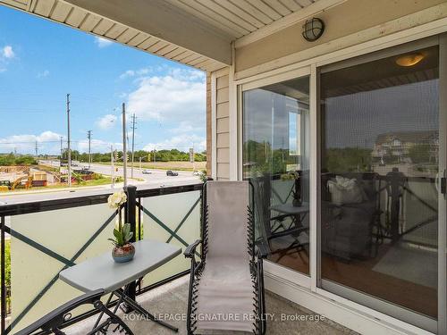 203-1005 Nadalin Hts, Milton, ON - Outdoor With Balcony With Exterior