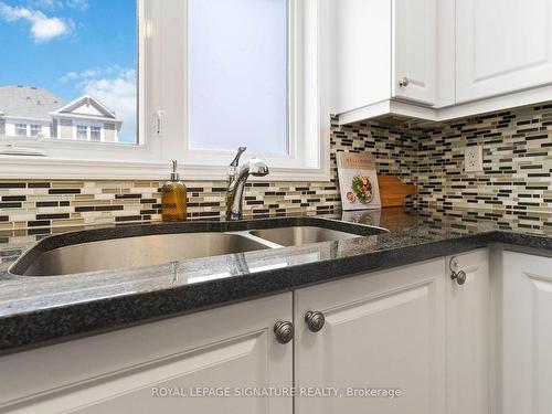 203-1005 Nadalin Hts, Milton, ON - Indoor Photo Showing Kitchen With Double Sink With Upgraded Kitchen