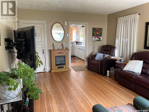 306 Main Street, White Fox, SK - Indoor Photo Showing Living Room With Fireplace