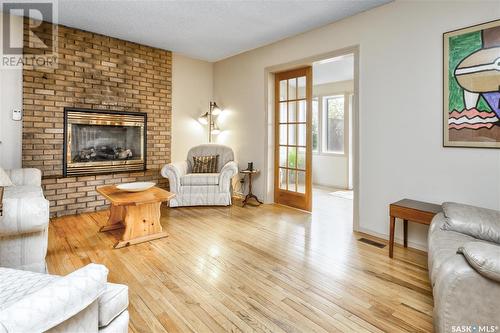 3379 Dent Crescent, Prince Albert, SK - Indoor Photo Showing Living Room With Fireplace