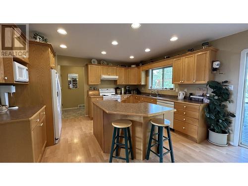 5153 Lakes Road, 108 Mile Ranch, BC - Indoor Photo Showing Kitchen With Double Sink