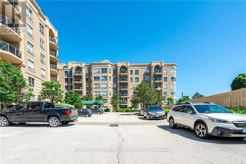 208 - 2075 Amherst Heights Drive, Burlington, ON - Outdoor With Balcony With Facade