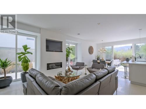 4075 Lakeshore Road, Kelowna, BC - Indoor Photo Showing Living Room With Fireplace