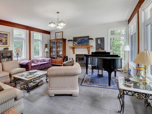 Family room - 4662 Ch. Laporte, Saint-Côme, QC - Indoor Photo Showing Living Room With Fireplace