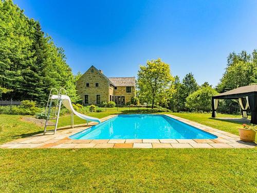 ExtÃ©rieur - 6 Rue Baldini, Stoke, QC - Outdoor With In Ground Pool With Backyard