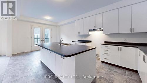 22 Sassafras Road, Springwater (Midhurst), ON - Indoor Photo Showing Kitchen With Double Sink