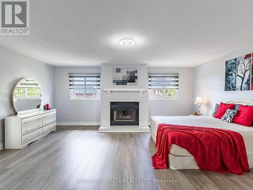 3821 Trelawny Circle, Mississauga, ON - Indoor Photo Showing Bedroom With Fireplace