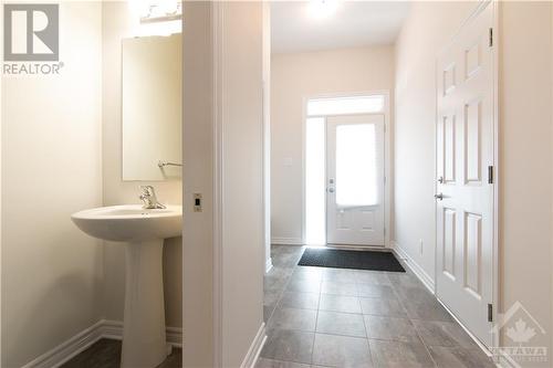 Entrance with powder room and garage door entrance - 1022 Kijik Crescent, Ottawa, ON - Indoor