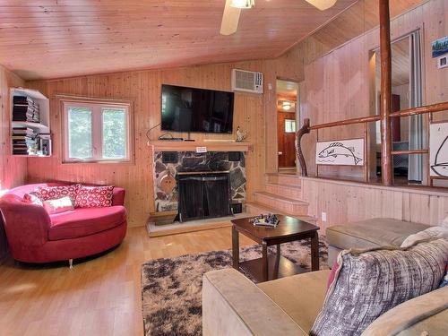 Living room - 186 Ch. Gagnon, Laniel, QC - Indoor Photo Showing Living Room With Fireplace