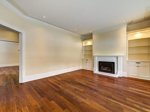 Living room - 4338 Av. Westmount, Westmount, QC - Indoor With Fireplace