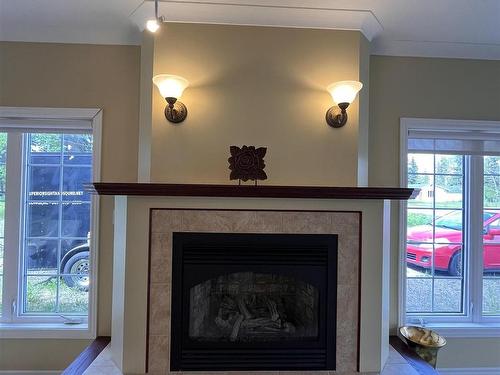 140 Birchcrest Road, Longlac, ON - Indoor Photo Showing Living Room With Fireplace