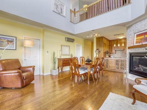 Overall view - 706-1180 Ch. D'Aylmer, Gatineau (Aylmer), QC - Indoor Photo Showing Living Room With Fireplace