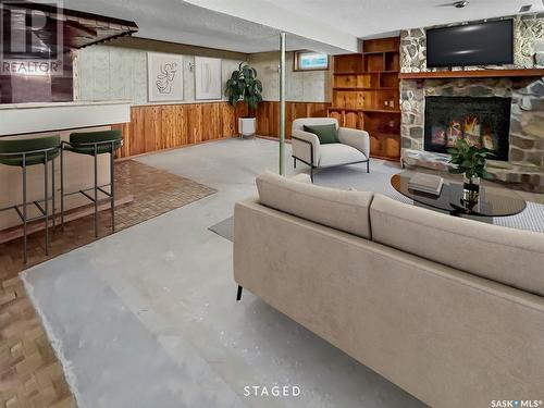 121 Allen Drive, Swift Current, SK - Indoor Photo Showing Living Room With Fireplace