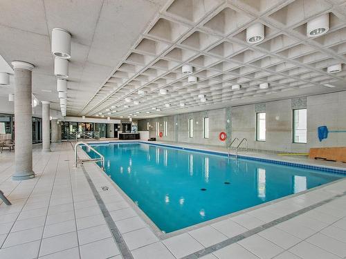 Piscine - 1111-4450 Prom. Paton, Laval (Chomedey), QC - Indoor Photo Showing Other Room With In Ground Pool