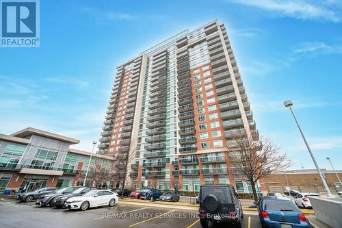 2009 - 215 Queen Street E, Brampton, ON - Outdoor With Balcony With Facade