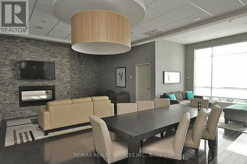 2009 - 215 Queen Street E, Brampton, ON - Indoor Photo Showing Dining Room With Fireplace