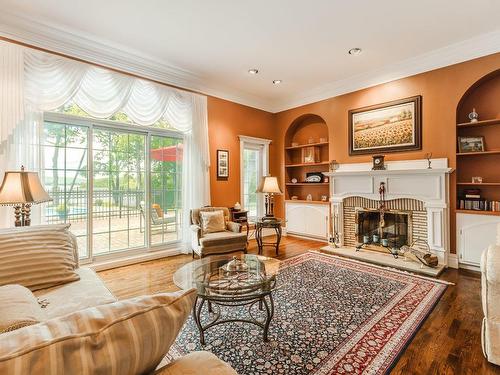 Salon - 5 Place Monk, Montréal (L'Île-Bizard/Sainte-Geneviève), QC - Indoor Photo Showing Living Room With Fireplace