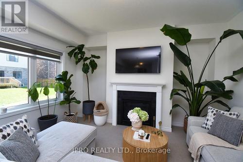 80 Scenic Ridge Gate, Brant (Paris), ON - Indoor Photo Showing Living Room With Fireplace