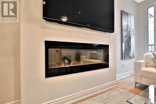 1024B Islington Avenue, Toronto, ON - Indoor Photo Showing Living Room With Fireplace