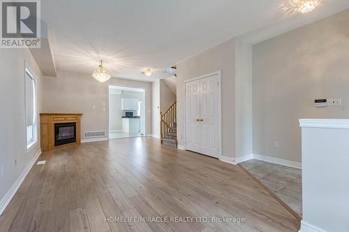 1028 Cumming Boulevard, Milton, ON - Indoor Photo Showing Living Room With Fireplace
