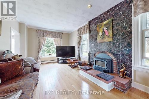 351219 Seventeenth Line, East Garafraxa, ON - Indoor Photo Showing Living Room With Fireplace