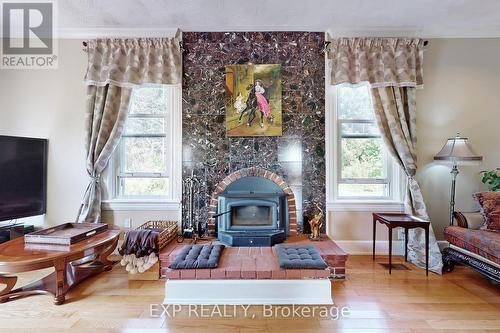 351219 Seventeenth Line, East Garafraxa, ON - Indoor Photo Showing Living Room With Fireplace