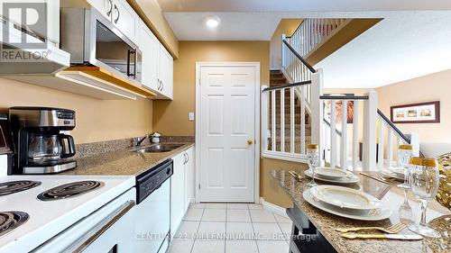 816 - 796468 Grey 19 Road, Blue Mountains, ON - Indoor Photo Showing Kitchen With Double Sink