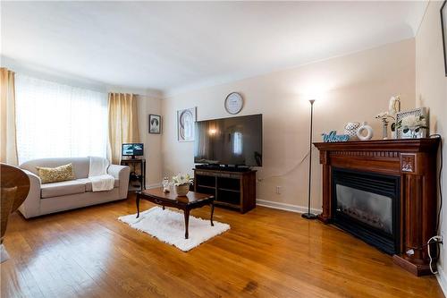 204 Parkdale Avenue S, Hamilton, ON - Indoor Photo Showing Living Room With Fireplace