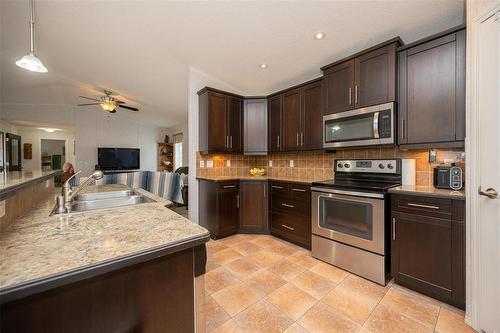 99 Sandale Drive, Winnipeg, MB - Indoor Photo Showing Kitchen With Double Sink