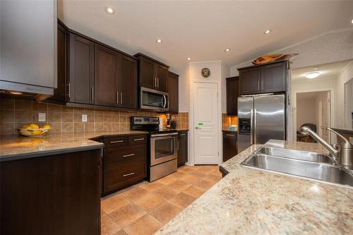 99 Sandale Drive, Winnipeg, MB - Indoor Photo Showing Kitchen With Double Sink