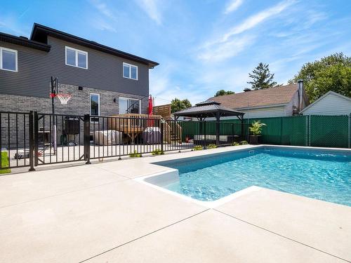 Cour - 5300 Boul. Westley, Longueuil (Saint-Hubert), QC - Outdoor With In Ground Pool