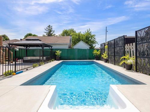 Cour - 5300 Boul. Westley, Longueuil (Saint-Hubert), QC - Outdoor With In Ground Pool With Backyard