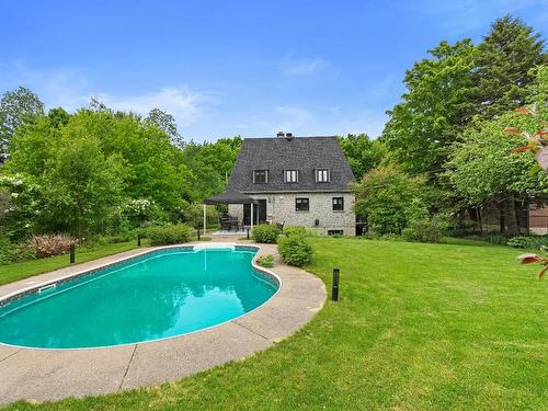 Piscine - 1425 Rue Du Bourgeon, Lévis (Les Chutes-De-La-Chaudière-Ouest), QC - Outdoor With In Ground Pool With Backyard