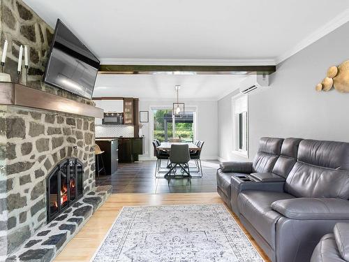 Salon - 1425 Rue Du Bourgeon, Lévis (Les Chutes-De-La-Chaudière-Ouest), QC - Indoor Photo Showing Living Room With Fireplace